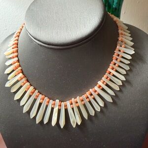 30s mother of pearls and coral necklace they called the Tarzan  , small neck